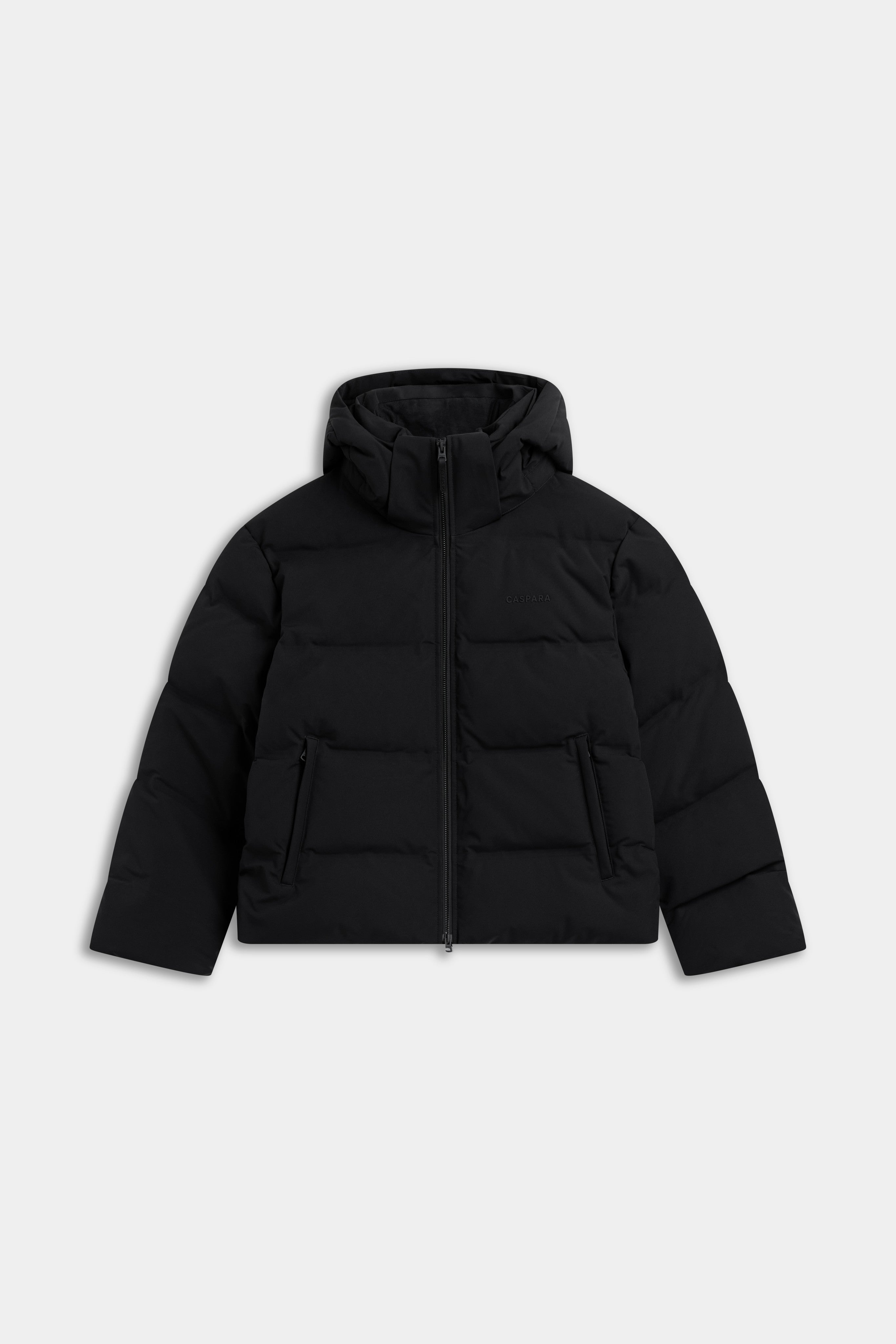 Front view of the black CASPARA W. Aurora hooded puffer jacket on a light grey background.